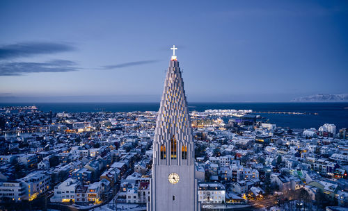 Architectural monument of church in illuminated city at night