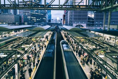 Blurred motion of train at railroad station platform