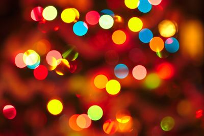 Defocused image of illuminated christmas lights