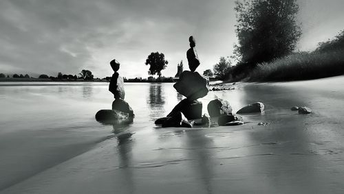 Stacked stones at lakeshore