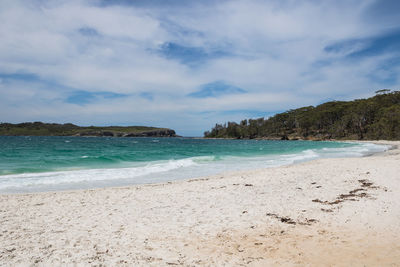 Scenic view of beach against sky