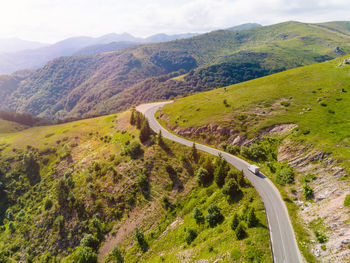 High angle view of road amidst mountains