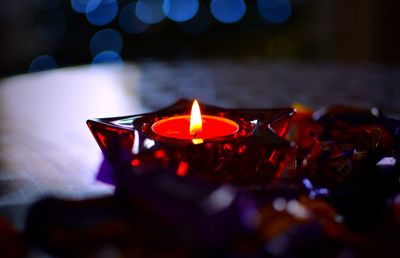 Close-up of burning oil lamp