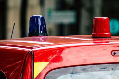 Close-up of red vintage car