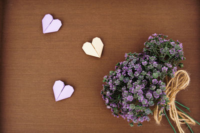 Directly above shot of purple and white flowers on table