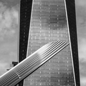 Low angle view of modern building against sky in city