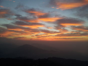 Scenic view of dramatic sky during sunset