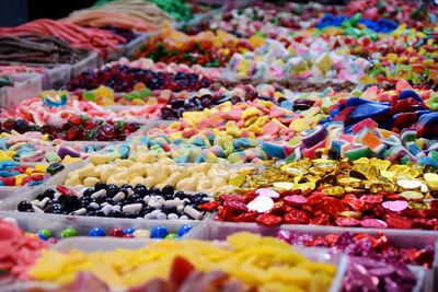 Full frame shot of multi colored candies for sale at market stall