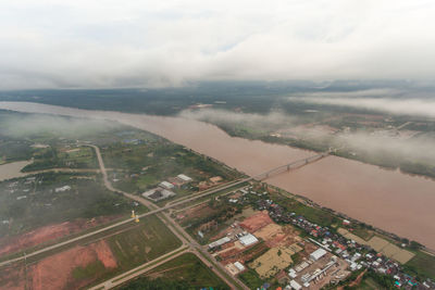 High angle view of buildings in city against sky