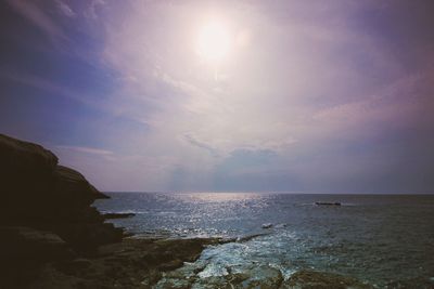 Scenic view of sea against cloudy sky