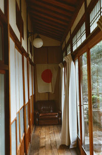 Empty corridor of building in uno, japan