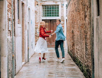 Women walking on footpath