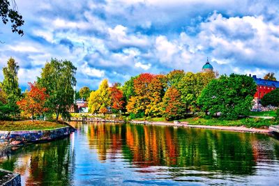 Scenic view of lake against sky during autumn