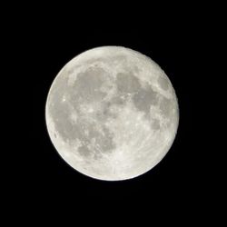 Close-up of moon against clear sky at night