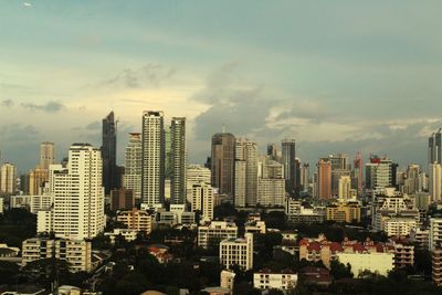 Buildings in city against sky