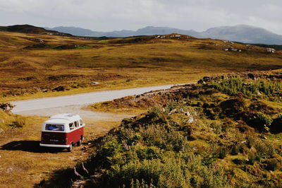 High angle view of van on field by road