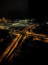 High angle view of light trails on road in city