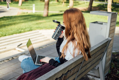 Mental health. work-life balance, online work job or education. redhead woman working typing on