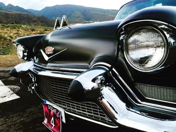 Close-up of vintage car on side-view mirror