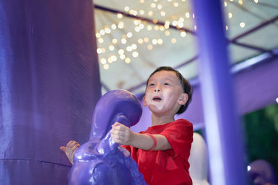 Close-up of child playing with toy