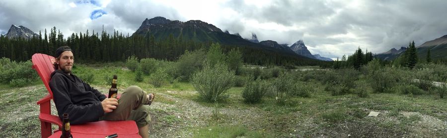 Rear view of man looking at mountains