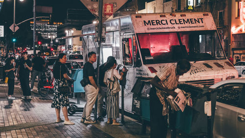 People on street in city