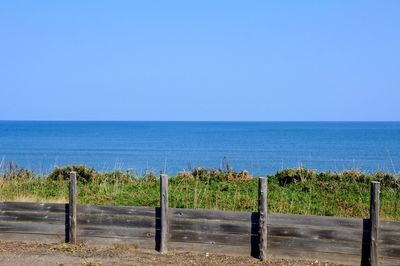 Scenic view of sea against clear sky