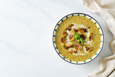 High angle view of soup in bowl on table