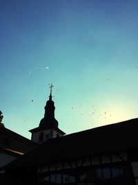Low angle view of built structure against blue sky