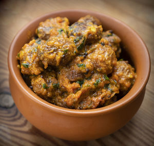 High angle view of meat in bowl on table