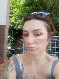 Portrait of young woman wearing hat