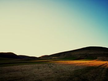 Scenic view of landscape against clear sky