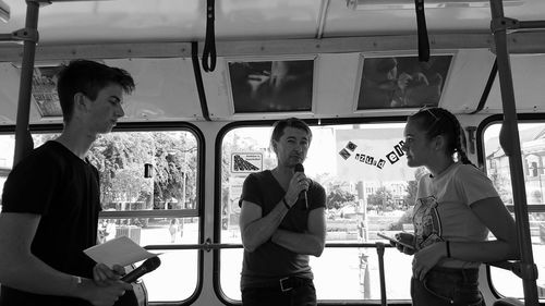 People standing in bus