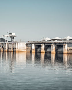 Bridge over river against clear sky