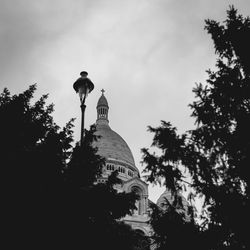 Low angle view of statue against sky