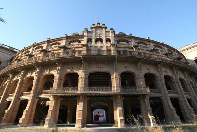 Low angle view of historical building against clear sky