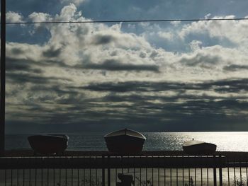 Close-up of beach against sky