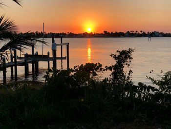 Scenic view of sea against sky at sunset