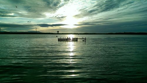 Scenic view of sea at sunset