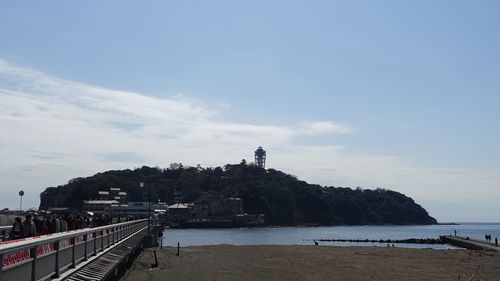 View of city against cloudy sky