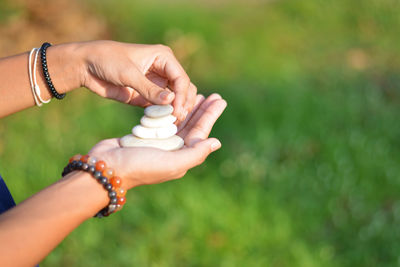 Close-up of woman holding hands