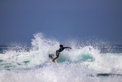 Man surfing in sea