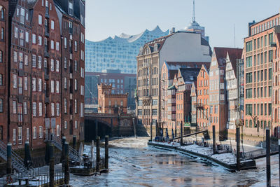 View of buildings in city against sky