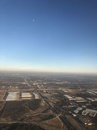 High angle view of buildings against clear sky