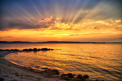 Scenic view of sea against sky during sunset