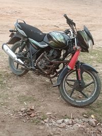 High angle view of bicycle parked on field