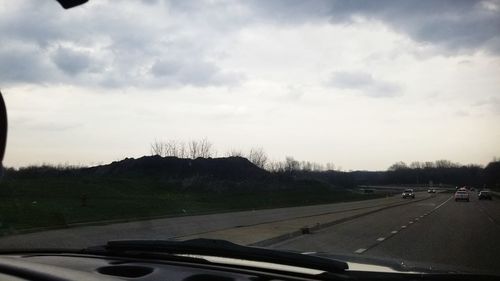 Road seen through car windshield