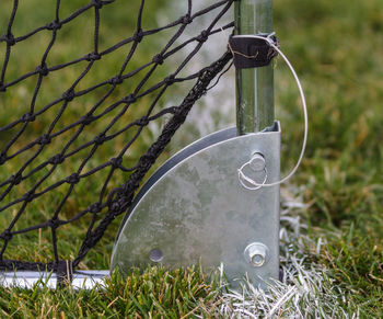 Base of soccer goal on field