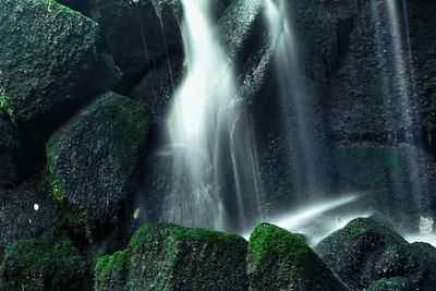 Long exposure of waterfall on rock