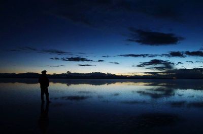 Scenic view of calm lake at sunset